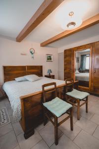 Postel nebo postele na pokoji v ubytování Bed & Breakfast Gabriella EXILLES