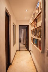 a corridor of a hallway with a long hallway at Finca Valentina in El Encón