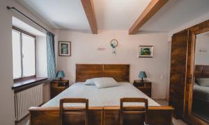 Postel nebo postele na pokoji v ubytování Bed & Breakfast Gabriella EXILLES