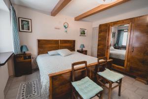 Postel nebo postele na pokoji v ubytování Bed & Breakfast Gabriella EXILLES