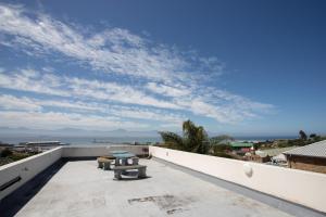 A balcony or terrace at Kaaia picturesque seaview apartment