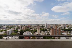 a view of a city from a balcony at Agustín I Apart in Paraná