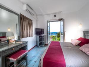 Postel nebo postele na pokoji v ubytování Silva Beach Hotel