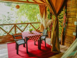 Balkón nebo terasa v ubytování Glamping Río Claro