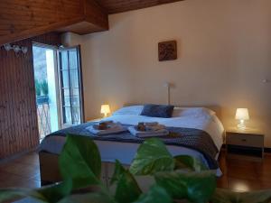 Postel nebo postele na pokoji v ubytování Hotel Valle Pesio Ristorante