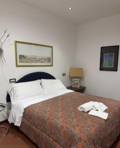 Postel nebo postele na pokoji v ubytování AliaJazz Green b&b