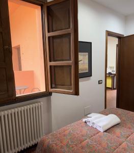 Postel nebo postele na pokoji v ubytování AliaJazz Green b&b
