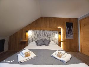 Postel nebo postele na pokoji v ubytování Hotel Valle Pesio Ristorante
