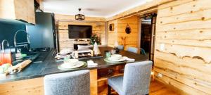 Kuchyň nebo kuchyňský kout v ubytování La Cabane de Marie