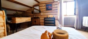 Postel nebo postele na pokoji v ubytování La Cabane de Marie