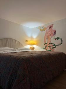 Postel nebo postele na pokoji v ubytování AliaJazz Green b&b