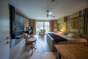 Postel nebo postele na pokoji v ubytování Guesthouse De Witte Merel Deluxe + 37 fotografií