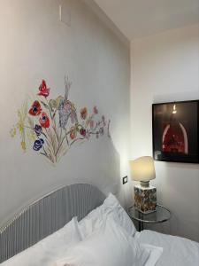 Postel nebo postele na pokoji v ubytování AliaJazz Green b&b