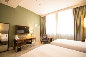 Postel nebo postele na pokoji v ubytování DoubleTree by Hilton Hotel & Spa Liverpool