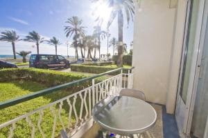 Garden Floor Condo with Promenade Sea View