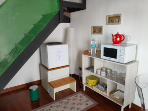 Kuchyň nebo kuchyňský kout v ubytování A casa di Rosa