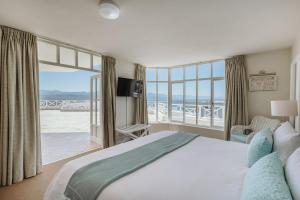Postel nebo postele na pokoji v ubytování Bayview Hotel