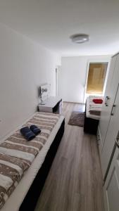 Posteľ alebo postele v izbe v ubytovaní Apartment Budin 2, Rijeka center