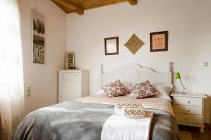Un pat sau paturi într-o cameră la Casa Beatriz Valdelinares