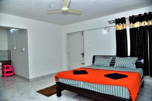 Postel nebo postele na pokoji v ubytování SHREE BALAJI PALACE Homestay