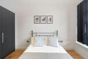 Ένα ή περισσότερα κρεβάτια σε δωμάτιο στο Livestay-Studio Apartment in Modern Development