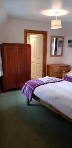 Katil atau katil-katil dalam bilik di Ness City Apartment