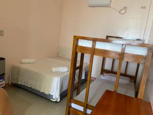 Postel nebo postele na pokoji v ubytování Kellocks' Seaview Apartelle