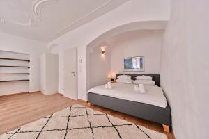 Katil atau katil-katil dalam bilik di Smile Apartments "Weinhimmel"
