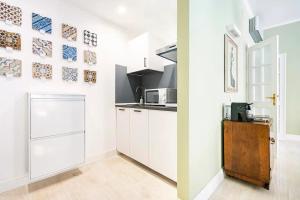 Cucina o angolo cottura di Appartamento luminoso di design in centro