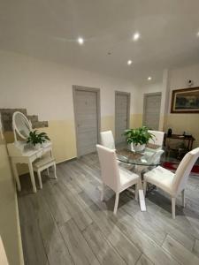 a living room with a table and chairs at Home Meryem LOC-04612 in Verona