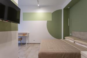 TV a/nebo společenská místnost v ubytování 633 APPIA DESIGN ROOM
