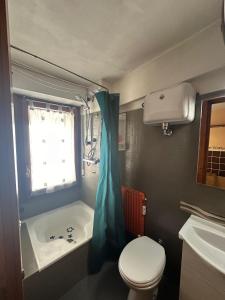 Ванная комната в Appartamenti Sud Ovest By MountainHouses