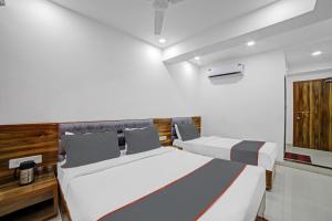 Katil atau katil-katil dalam bilik di HOTEL TAPOVAN IN