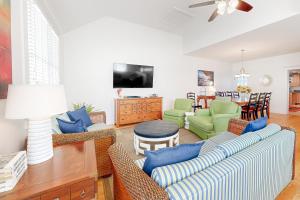 a living room with a couch and chairs at Town of Rehoboth Beach 45 Baltimore Ave in Rehoboth Beach