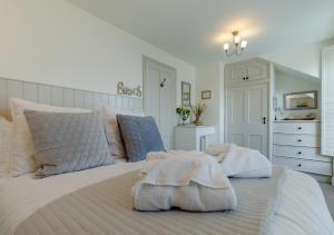 Postel nebo postele na pokoji v ubytování Gwylan House