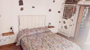 Postel nebo postele na pokoji v ubytování Casita el Parral