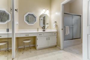 a white bathroom with a sink and a shower at 2 Bed 2 Bath Vacation home in Whittier I in Whittier +22 photos