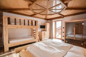 Postel nebo postele na pokoji v ubytování Agritur LA DASA