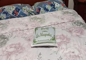 Letto o letti in una camera di La Magnolia B&B