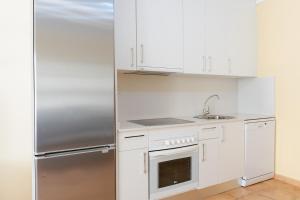 Kuchyňa alebo kuchynka v ubytovaní Villas y Apartamentos El Sultan