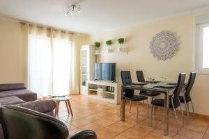 Posedenie v ubytovaní Villas y Apartamentos El Sultan