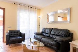 Posedenie v ubytovaní Villas y Apartamentos El Sultan