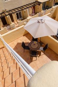 Posedenie v ubytovaní Villas y Apartamentos El Sultan