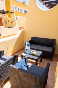 Posedenie v ubytovaní Villas y Apartamentos El Sultan