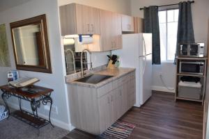 Η κουζίνα ή μικρή κουζίνα στο LV5 Upper Floor Suite