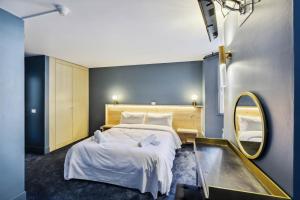 Voodi või voodid majutusasutuse HOTEL TURAN toas