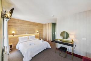 Voodi või voodid majutusasutuse HOTEL TURAN toas