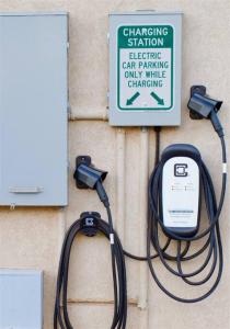 a charging station and a sign on a wall at ZC2 Home Base for Zion With Two Masters in La Verkin