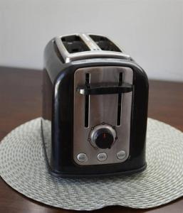 a black and silver toaster sitting on a table at ZC2 Home Base for Zion With Two Masters in La Verkin
