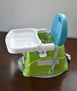 a green and white toy toilet sitting on a table at ZC2 Home Base for Zion With Two Masters in La Verkin